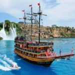Pirate ship from Belek to Lara Beach and Duden Waterfall: swimming in Turtle Bay, lunch, animation and foam party, hotel transfer included.