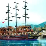 Пиратский корабль в Кемере купание в живописных бухтах Фазелис, Райская, Мунлайт и загадочной Пиратской пещере. Музыка, анимация, пенная вечеринка!