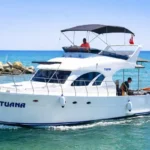 Belek'te Tuana VIP yat kiralama - özel seyir, transferler, gurme öğle yemeği, Düden Şelalesi'nde yüzme ve premium hizmet ile gün batımı güzergahı.